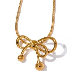 Gold plated bow necklace